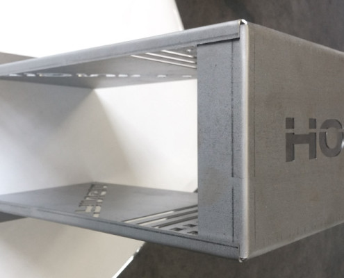 Narrow opening with return leg 3 times opening width. Custom tooling and design manufactured in house.
